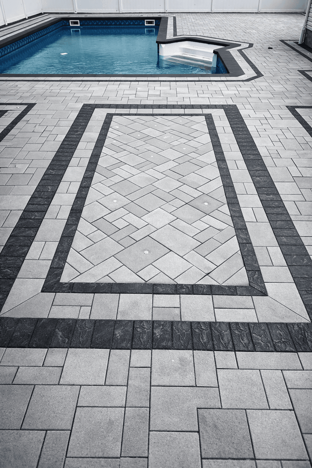 Paver patio extension showing expert craftsmanship on Long Island