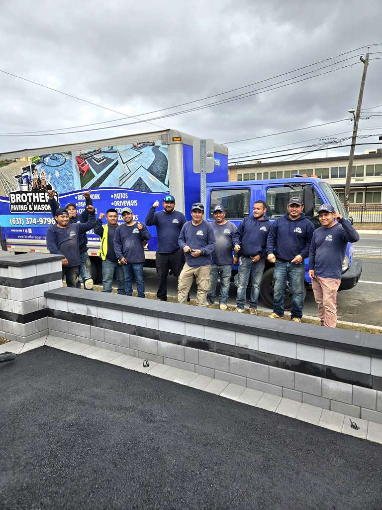 The full Brothers Paving and Masonry crew on a commercial jobsite