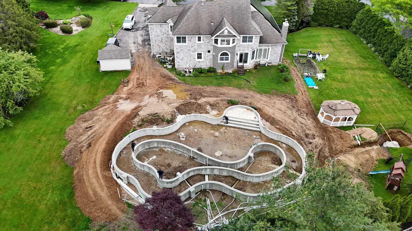 Overhead of the excavated rear yard with the river shell formed in open ground, East Northport