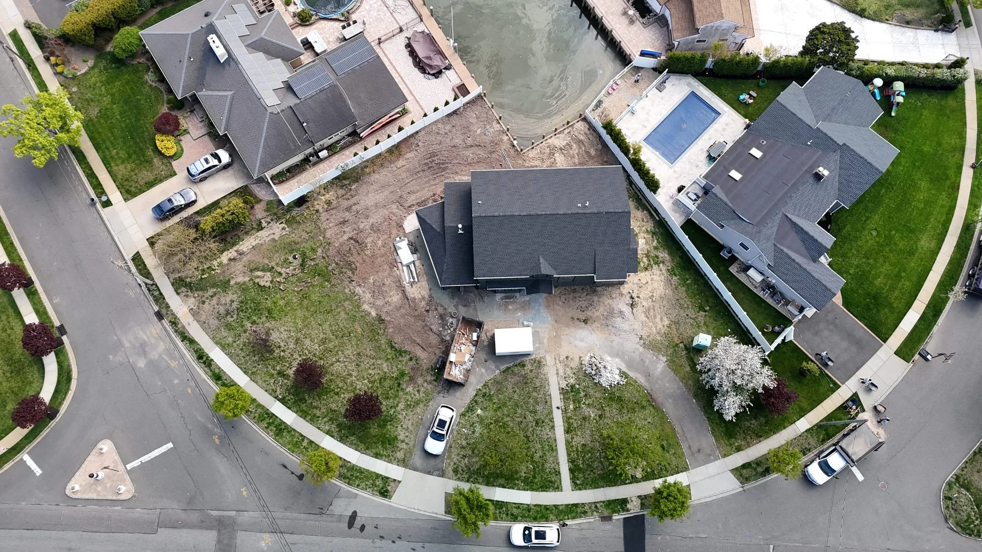 Overhead of the bare canal-front lot before construction, Massapequa