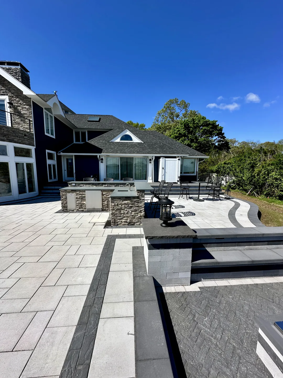 The kitchen and deck seen back toward the house, Great River