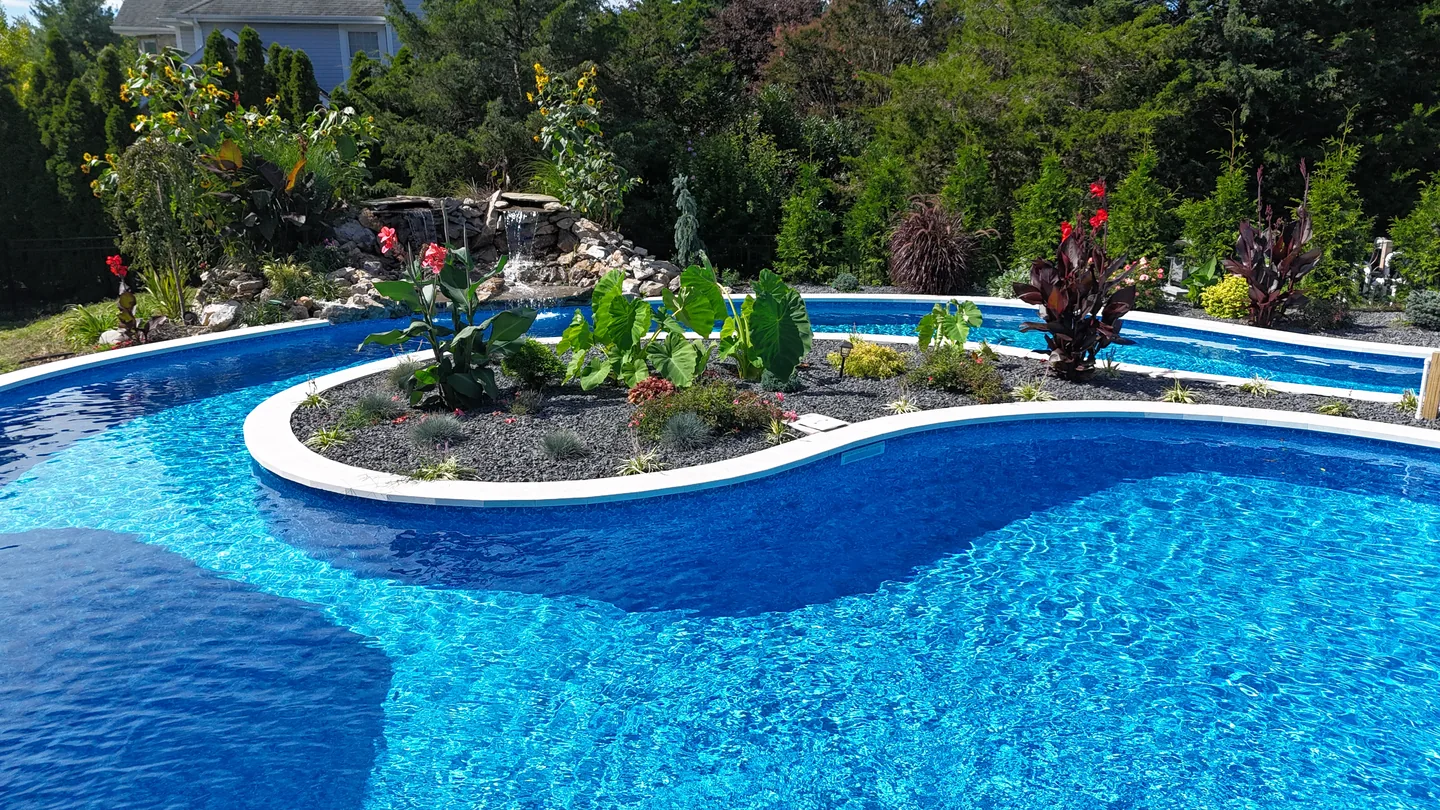 The lazy river curving around the planted centre island, East Northport