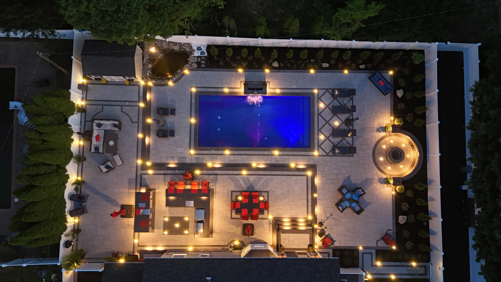 Overhead of the finished lit pool, spa, kitchen and fire terrace, Nesconset